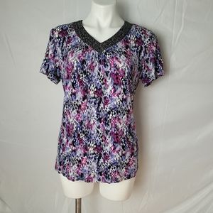 Purple pattern top with bedazzled neckline